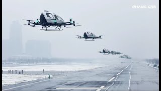 12 EH216-S pilotless eVTOLs take off simultaneously in Hefei, China