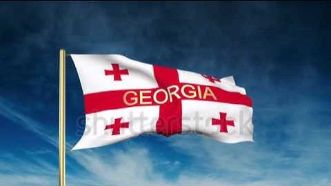 georgia flag slider style with title. Waving in the wind with cloud background animation Stock