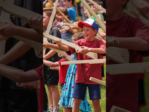 Kids March with the Militia in Field of Battle