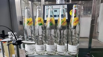 High round bottle label applicator wrap-around labeling machine test video