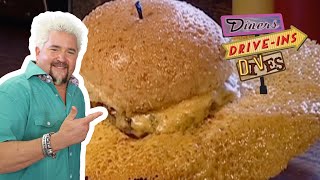 Guy Fieri Eats a Burger with a MASSIVE Cheese Skirt | Diners, DriveIns and Dives | Food Network