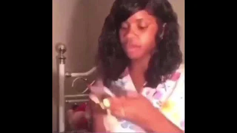 Stan Twitter: Girl chewing gum and typing on a phone with long nails