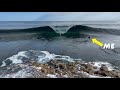 Surfing dream scenario tubes over dry reef