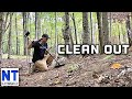 Clearing the ground & digging stuff buried in the ground metal detecting a cellar hole