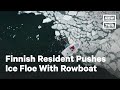 Man Moves Giant Ice Floe With His Rowboat