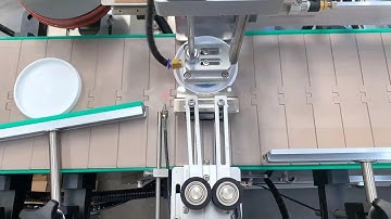 tamp labeling applicator inline labeller with lids feeder &collector for Switzerland customer