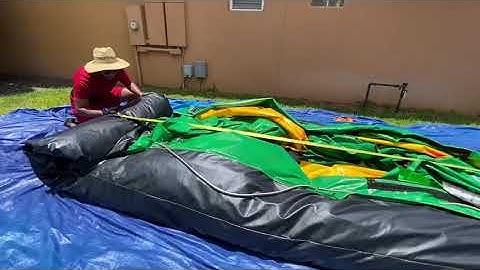 Roll up waterslide with WARN PullzAll portable winch for bounce house business - August 1, 2020