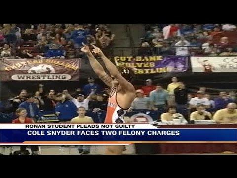 Champion Montana high school wrestler denies drug, sex abuse charges