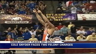Champion Montana high school wrestler denies drug, sex abuse charges