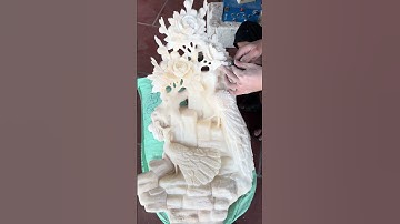 Tác phẩm điêu khắc trên vỏ sò hóa thạch nghìn năm : PHU THÊ VIÊN MÃN