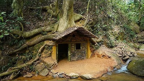 Chiseling Rocks to Build an Underground House Under a Giant Tree. Survival Camping Alone