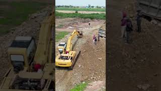 Excavator driving to help dump truck stuck #shorts