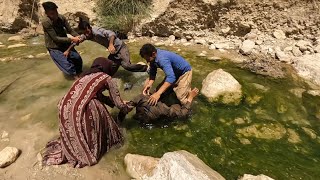 Two nomadic men fight over water supply