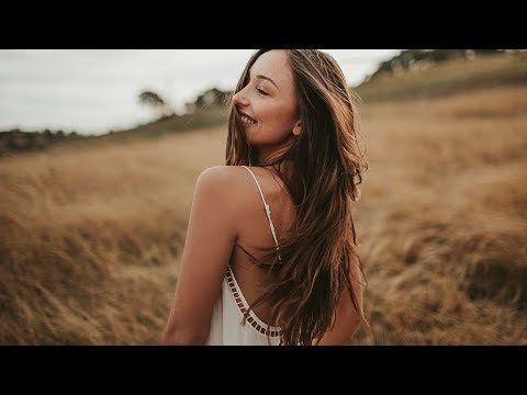 Amazing woman in glasses standing in confident pose. Outdoor portrait of  fascinating latin female m Stock Photo by look_studio