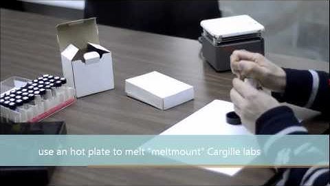 Polarizing microscope for art examination 1 slide mounts.wmv