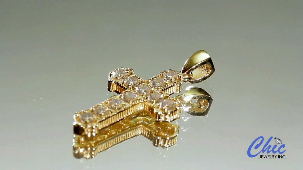 Solid yellow gold Cross with cubic zirconia item 