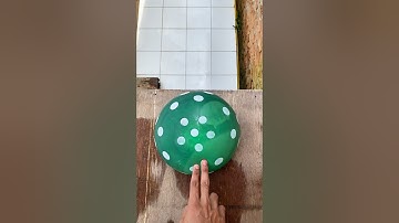 Experiment: Will this polka dot water balloon explode if dropped from a height?