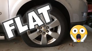 HOW TO CHANGE A SPARE TIRE ON A CHEVY TRAVERSE!