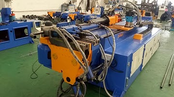 Automatic pipe bending machine with hole puching function