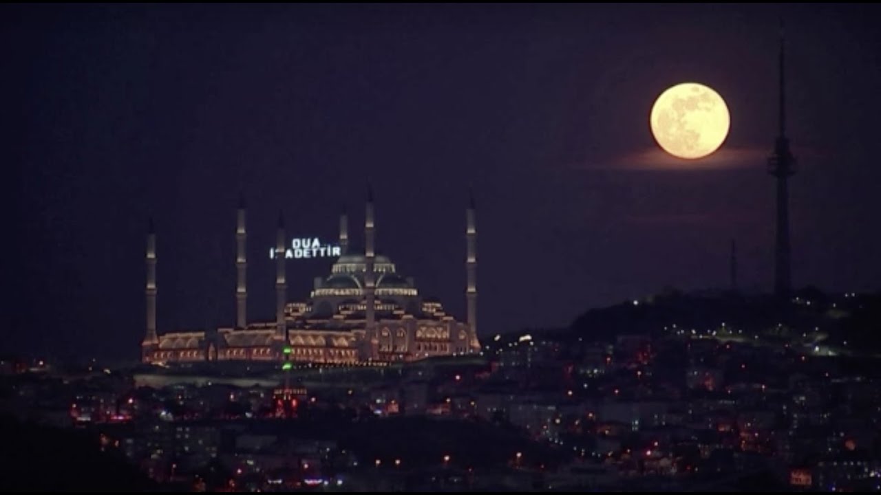 Last "supermoon" of 2020  rises on world starting to emerge from lockdowns