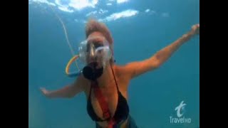 Blonde Woman Goes Snuba Diving