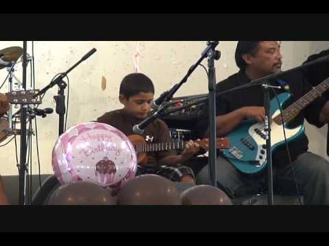 Logan Kalawaia sings for his sister Madison's firs...