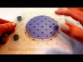 Stenciling a cookie with royal icing