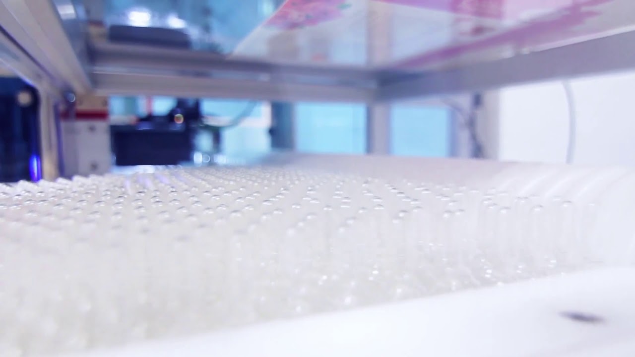 s glass medical ampoules on conveyor line pharmaceutical manufacturing process at YouTube