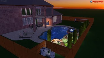 Free form pool with spa and small waterfall with accent rock