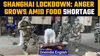 Covid cases surge in Shanghai | Anger grows over lockdown amid food shortages | OneIndia News