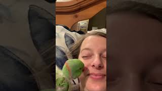 A Lady and Her Precious Bird Playfully Interact