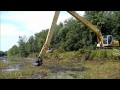 Long Reach Excavator Dredging Canal
