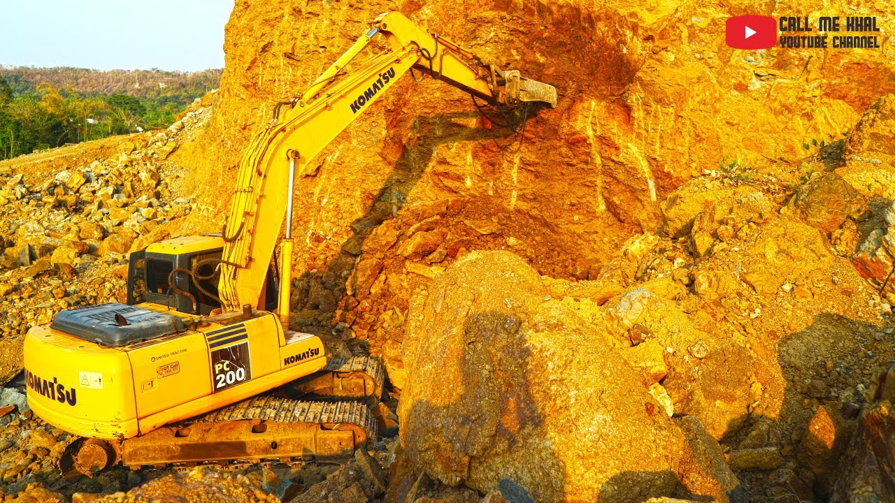 Excavator Scrapes Hill Wall And Is Almost Buried By A Rock Slide - YouTube