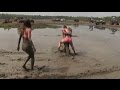 Girls get thrown in the Mud