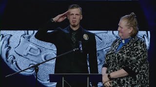 Officer Peter Jerving's brother salutes him