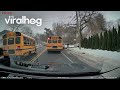 School Bus Drives Around a Stopped School Bus || ViralHog