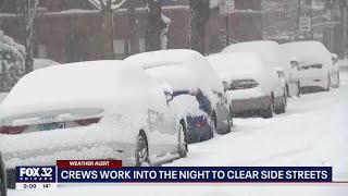 Crews working into the night to clear snow from Chicago streets