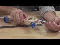 Building a Car Mechanism with Precision String Length and Knot Techniques