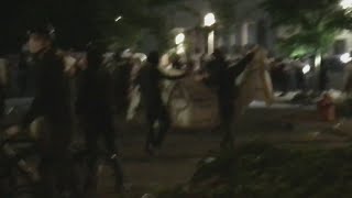 Portland police declare unlawful assembly as protesters barricade North Precinct