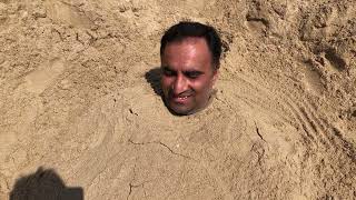 Friend buried me in Beach sand