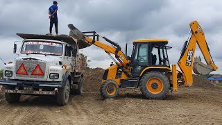 JCB Backhoe Machine Loading Gravel in Dump Truck - JCB And Tata Truck Working on Sandy Place