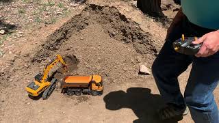 Top race TR211 (huina580) excavator, TR212 dump truck (huina 582) entry level rc construction demo.
