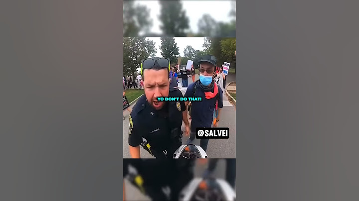 Protesters try to stop biker in the middle of the road #bike #trending #shorts @675kane