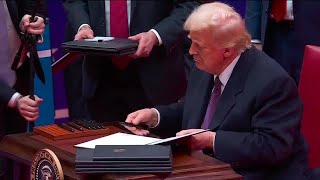 President Donald Trump signs multiple executive orders during first day in office