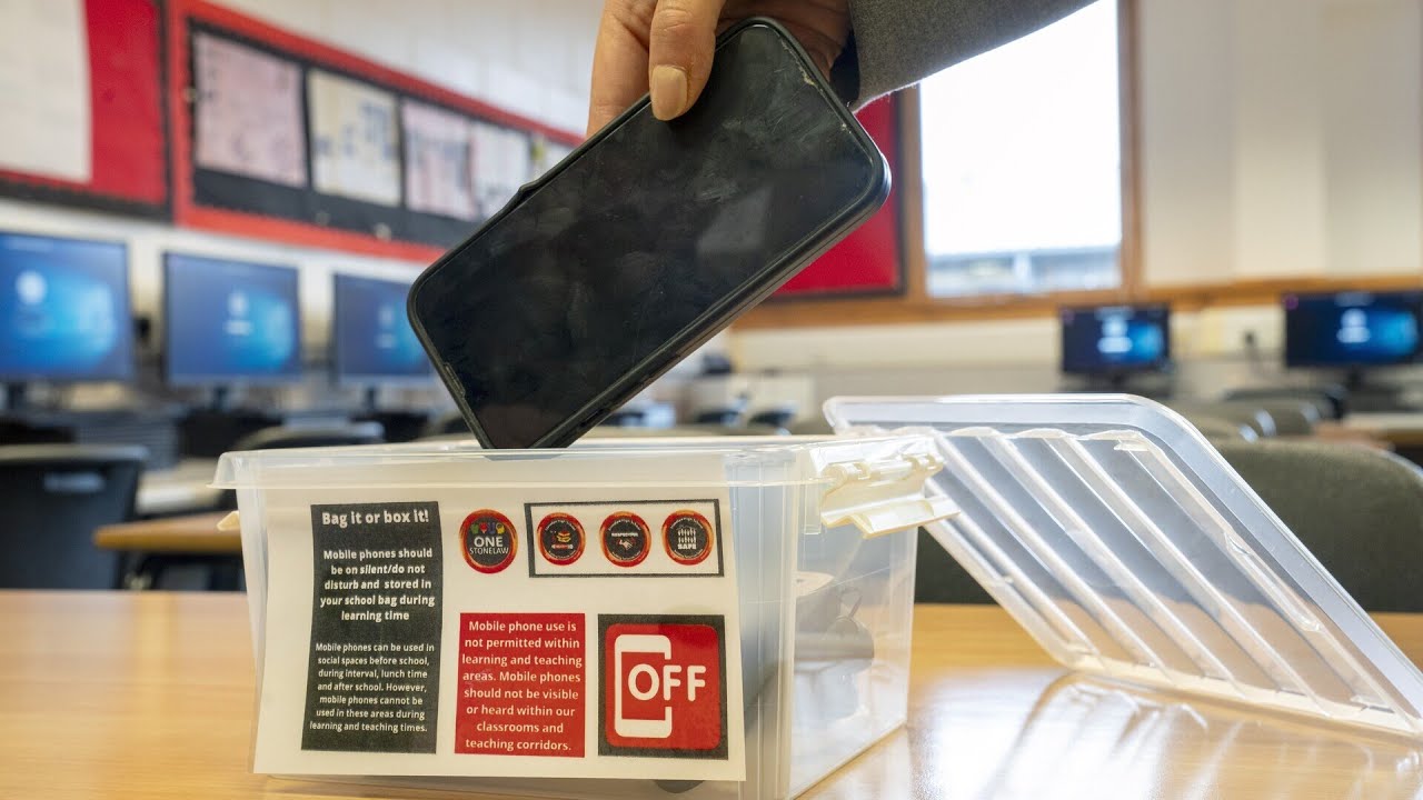 'No phones, more brains': Schools crack down on screens - YouTube