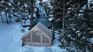 SNOW CAMP AT FROZEN WATERFALL