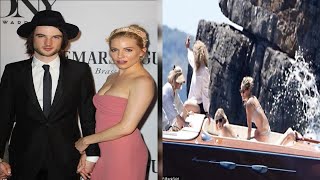 Sienna Miller slips into a skimpy grey bikini as she enjoys boat trip