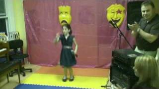 Leah S. sings in school 'Let me entertain you'