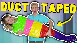 100 LAYERS OF DUCT TAPE CHALLENGE!!
