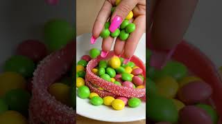 Filling platter with sweets Candies colourful rainbow candy sweet 